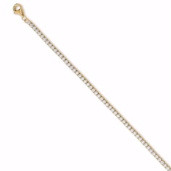 Forgyldt tennisarmbånd med små klare sten og lås. Elegant og justerbart design.