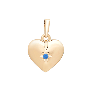 Hjerteformet guldsmykke med blå safir i midten, elegant og stilrent design.