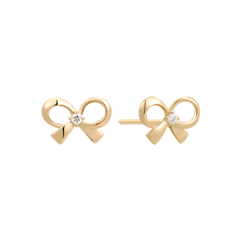 Guld ørestikker i sløjfeform med klar sten i midten, elegant og dekorativt design.