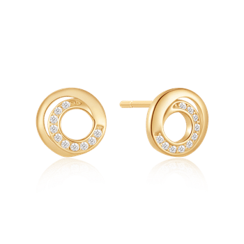Cirkulære ørestikker i spiraldesign med guldlignende finish og små sten langs kanten.