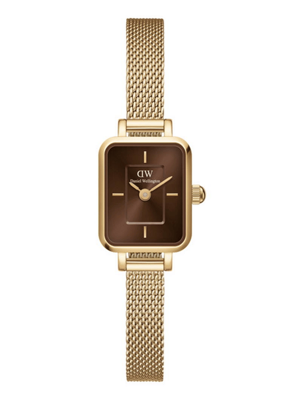 Daniel Wellington ur med mørk urskive, guldrem og minimalistisk design.