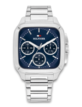 Tommy Hilfiger ur med blå rektangulær urskive, tre sub-dials og metalrem.
