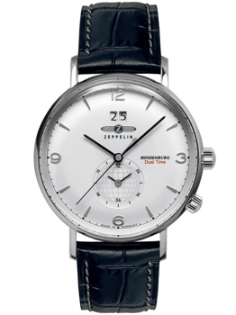 Rund urskive med subdial, datovisning, tekst "Hindenburg Dual Time", mørk læderrem med sømme.