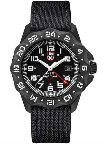 Sort Luminox ur med 24-timers bezel, blå/turkis lysende tal og vævet sort tekstilrem.